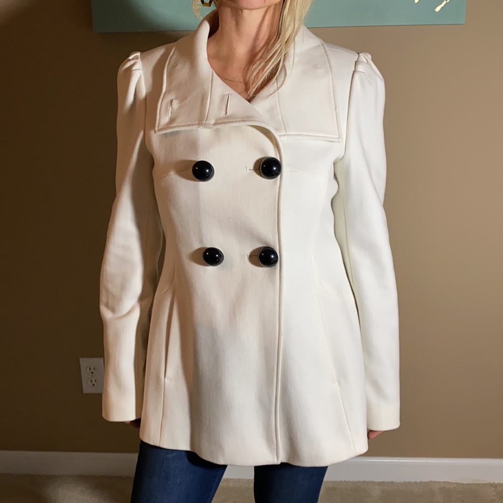 Wilson’s White pea coat with puff shoulders
